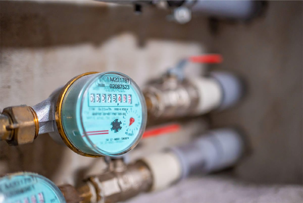 Close-up of a water meter dial used to check for water leaks in Garland homes
